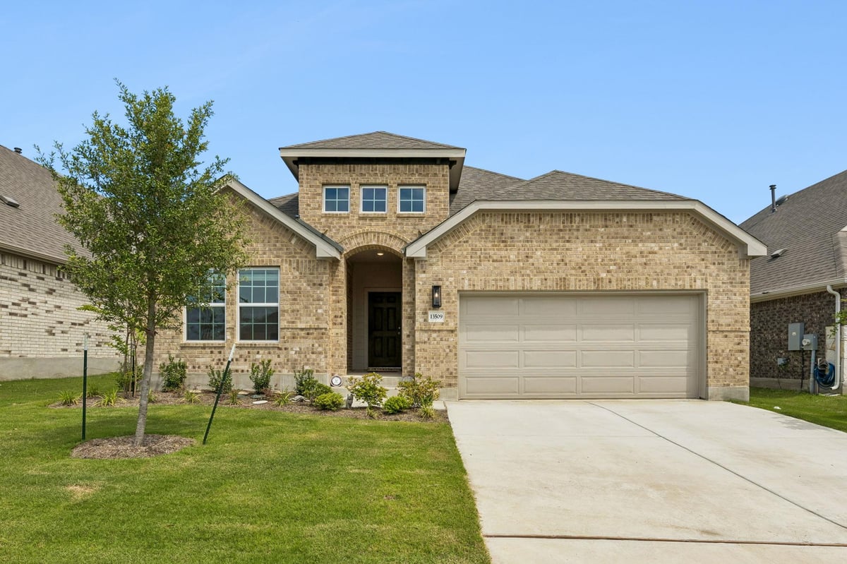 View 13509 Barn Chime ST in Creeks Crossing 13509 Barn Chime ST - front exterior - Luxury home in Creeks Crossing, Elgin, TX