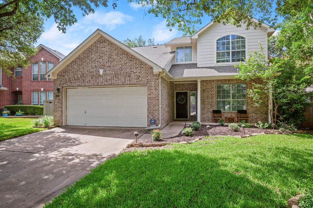 View 13521 Oregon Flats Trl in Scofield Farms Ph 10 Sec 01 13521 Oregon Flats Trl - front exterior - Luxury home in Scofield Farms Ph 10 Sec 01, Austin, TX