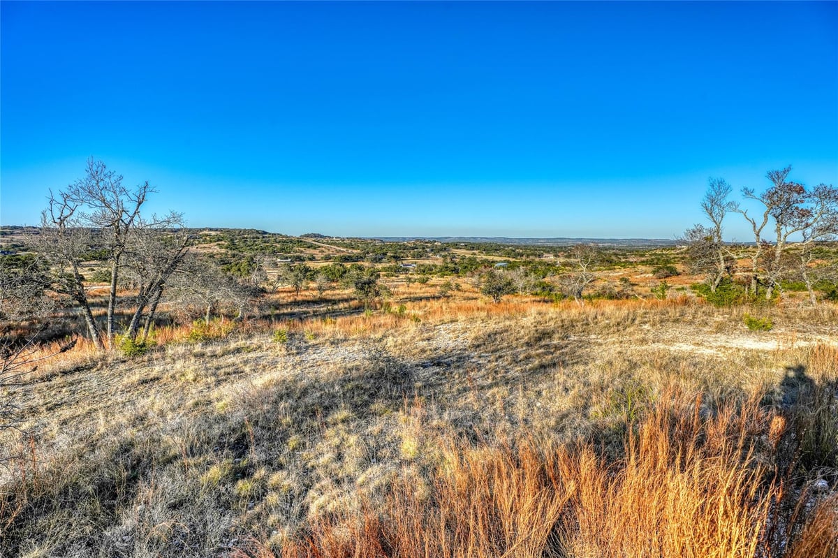 Primary bedroom at 136 & 137 Falling Oak Dr - MAJESTIC HILLS RANCH, Blanco, TX