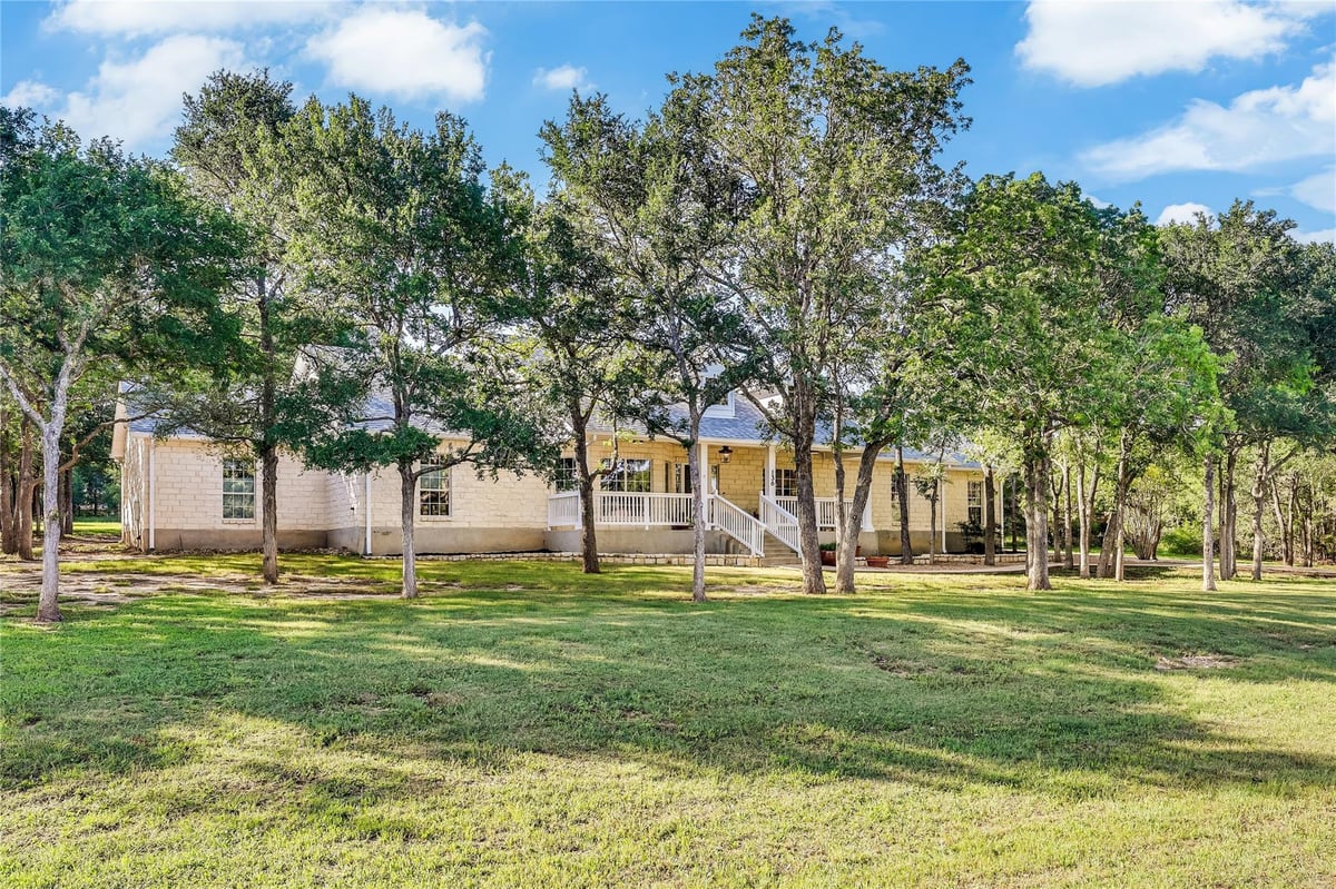 136 Territory DR - front exterior - Luxury home in The Colony Sec Three, Bastrop, TX
