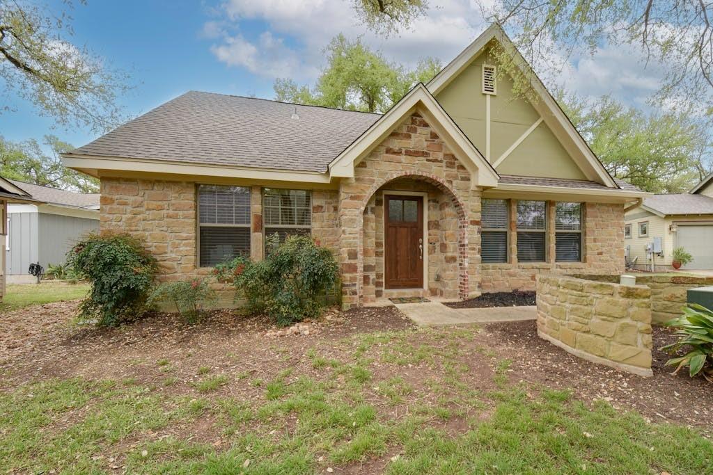 View 13604 Caldwell Dr Unit #41 in Cottages At Lake Creek Condo 13604 Caldwell Dr Unit #41 - front exterior - Luxury home in Cottages At Lake Creek Condo, Austin, TX
