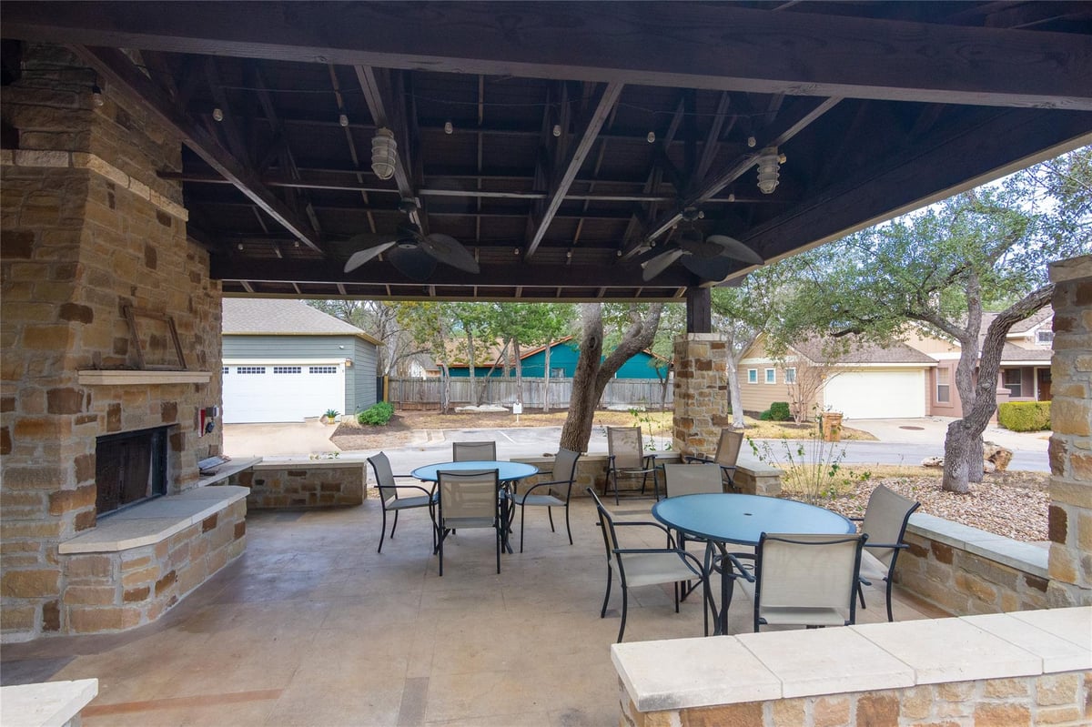 View 13604 Caldwell DR Unit #57 in Cottages At Lake Creek Condo 13604 Caldwell DR Unit #57 - front exterior - Luxury home in Cottages At Lake Creek Condo, Austin, TX