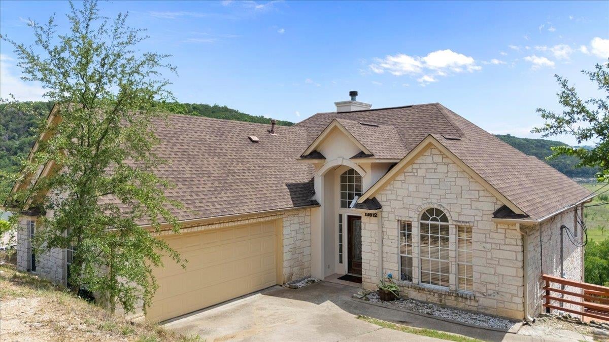 View 13612 Bullick Hollow Rd in Adams Beaty & Moulton Surv 13612 Bullick Hollow Rd - front exterior - Luxury home in Adams Beaty & Moulton Surv, Austin, TX