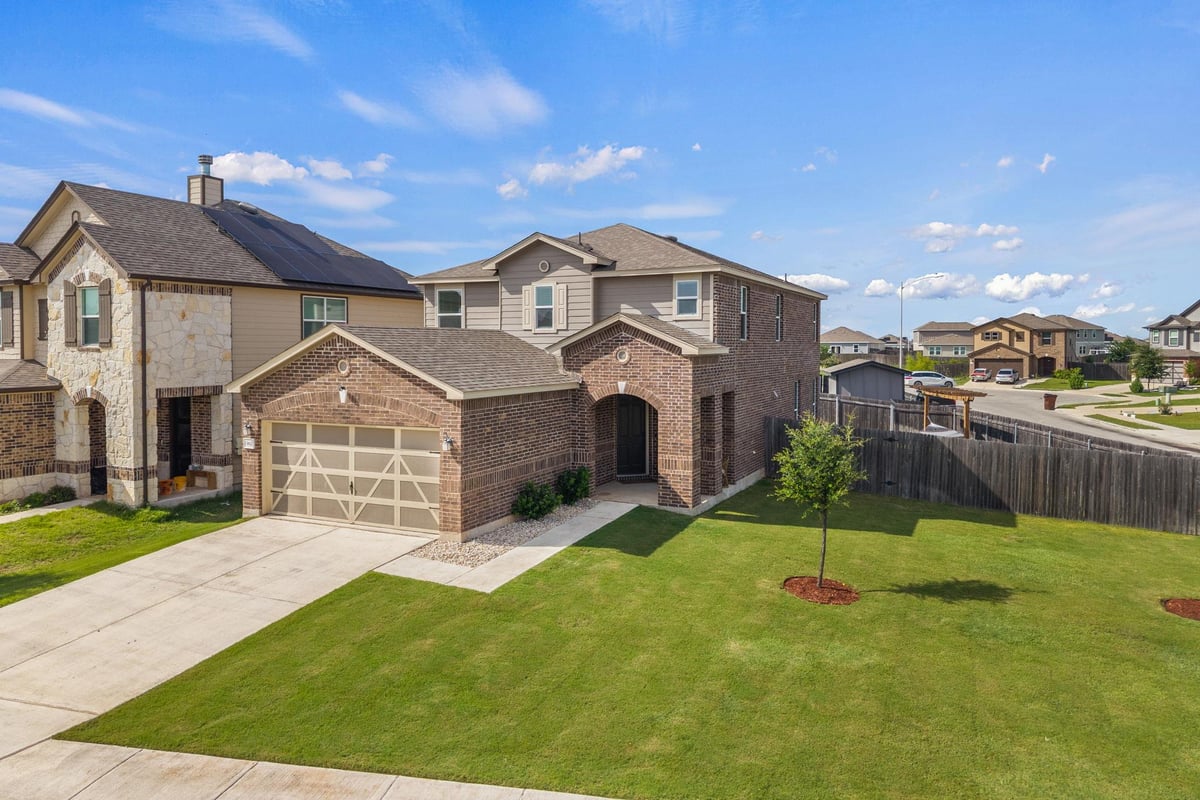 View 13612 Martha Washington PL in Presidential Mdws Sec Fifteen 13612 Martha Washington PL - front exterior - Luxury home in Presidential Mdws Sec Fifteen, Manor, TX