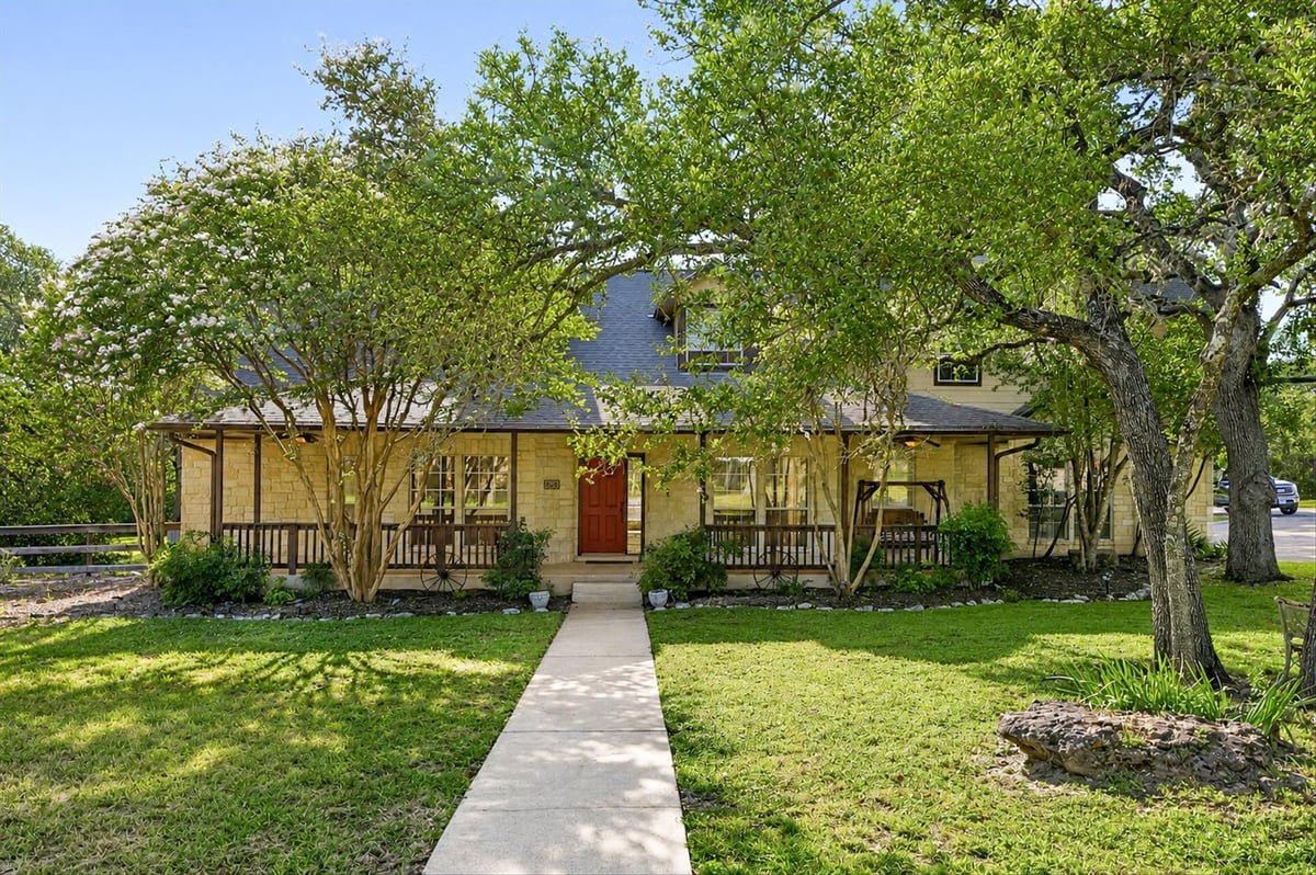 View 13615 Copperleaf TRL in Copper Hills 13615 Copperleaf TRL - front exterior - Luxury home in Copper Hills, Manchaca, TX