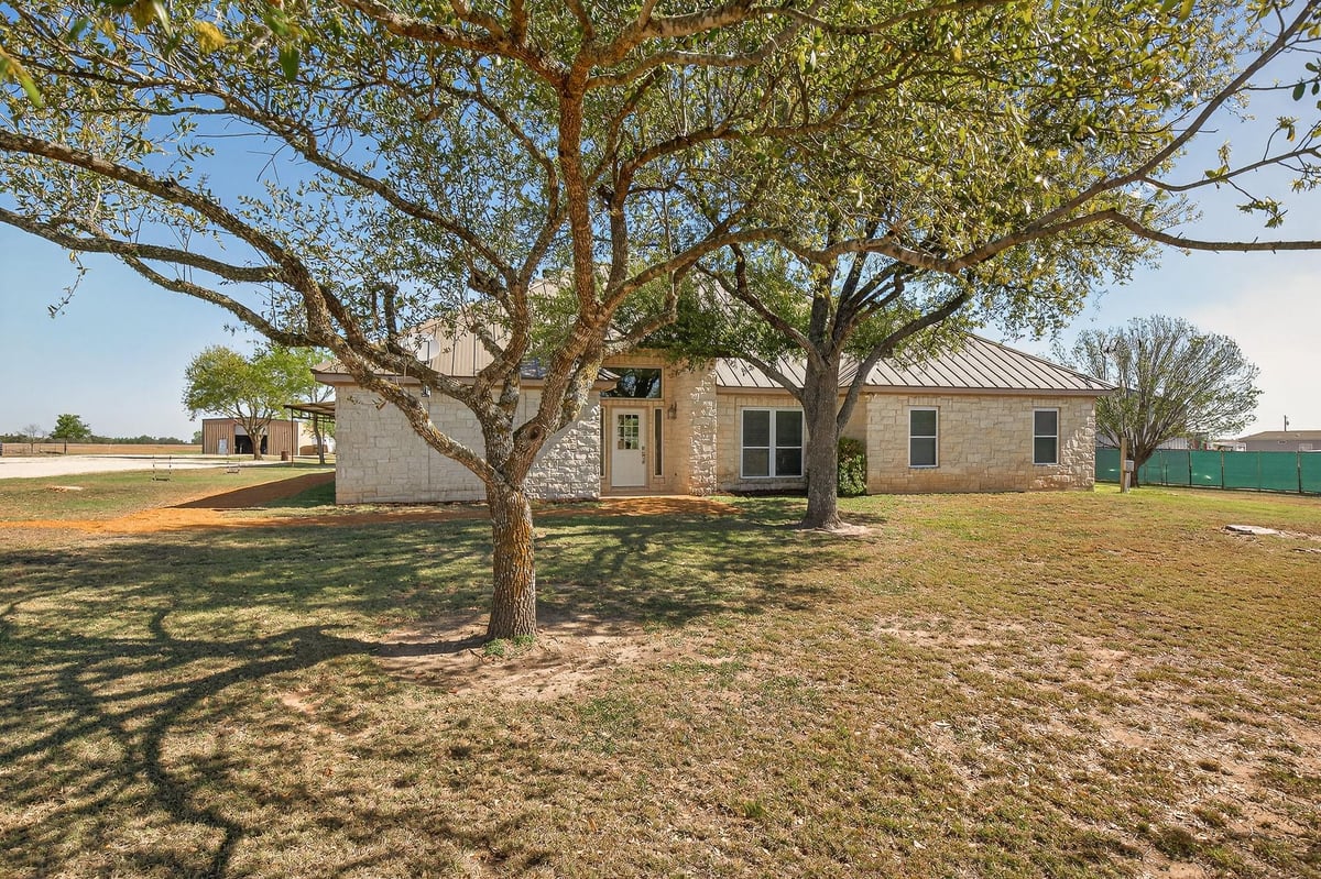 View 13639 Abrahamson Rd in Thiem Ranch 13639 Abrahamson Rd - front exterior - Luxury home in Thiem Ranch, Manor, TX