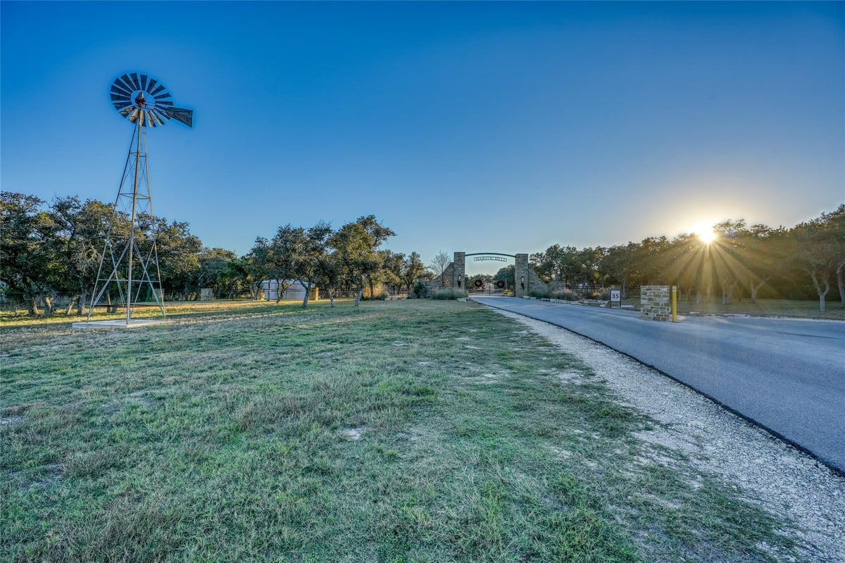 View 137 Falling Oak Dr in MAJESTIC HILLS RANCH 137 Falling Oak Dr - front exterior - Luxury lot in MAJESTIC HILLS RANCH, Blanco, TX