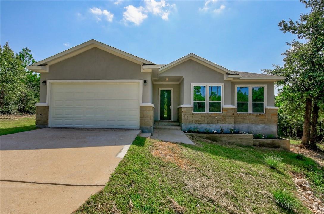 View 137 Lakeside DR in Pine Forest Unit 12 P Iii 137 Lakeside DR - front exterior - Luxury home in Pine Forest Unit 12 P Iii, Bastrop, TX