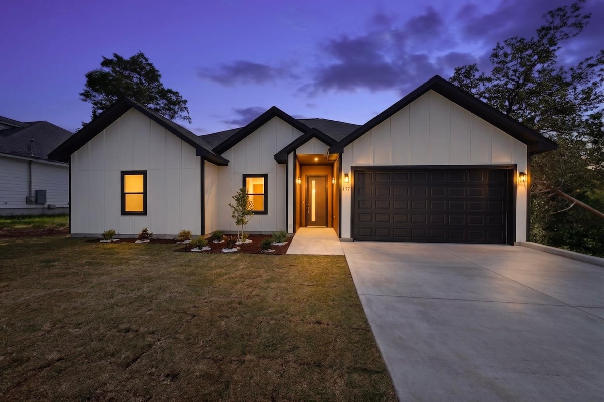 View 137 N Pohakea DR in TAHITIAN VILLAGE 137 N Pohakea DR - property photo 1 - Luxury home in TAHITIAN VILLAGE, Bastrop, TX