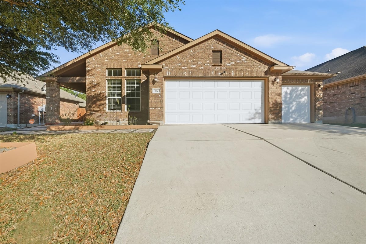 View 137 Orchard Hill Trl in Sunfield Ph One Sec One 137 Orchard Hill Trl - front exterior - Luxury home in Sunfield Ph One Sec One, Buda, TX