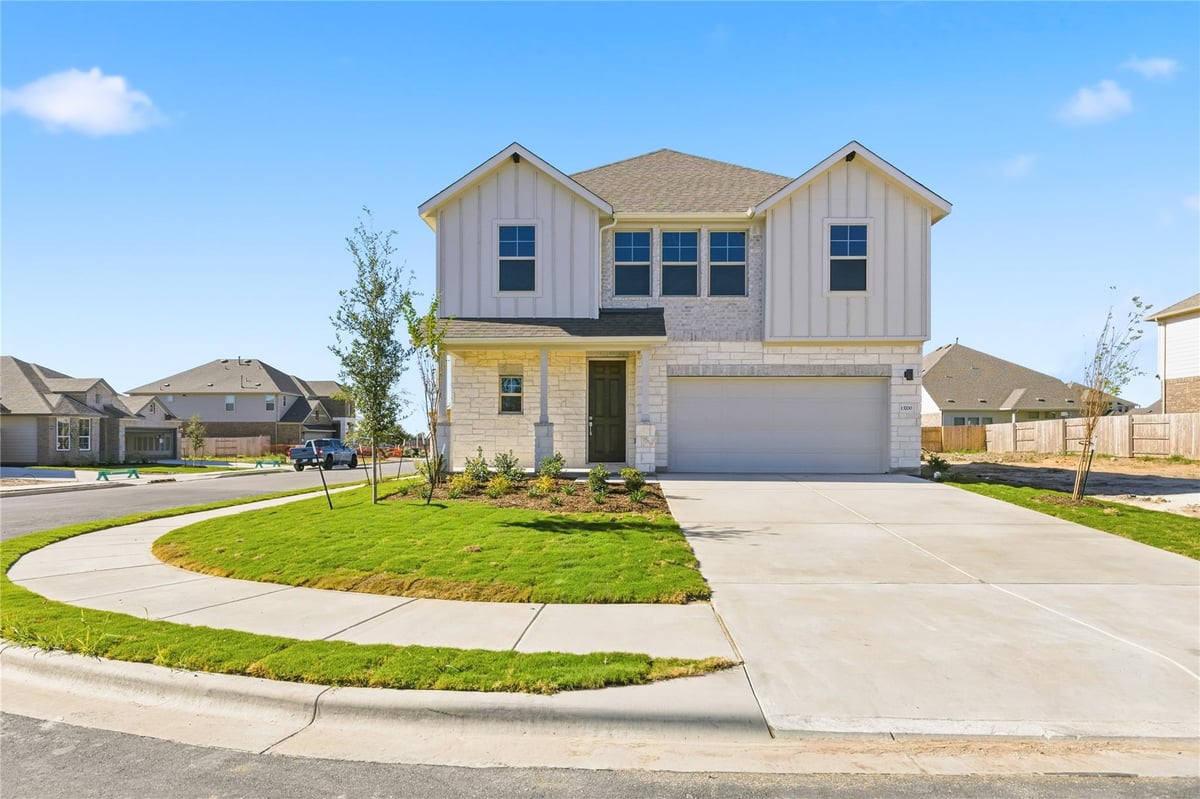 View 13700 Tucker Hedge Pass in Briarwood 13700 Tucker Hedge Pass - front exterior - Luxury home in Briarwood, Elgin, TX