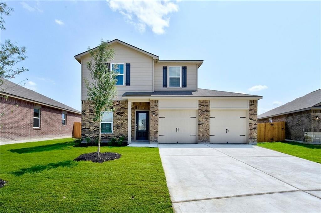 View 13713 Henry A. Wallace LN 13713 Henry A. Wallace LN - front exterior - Luxury home in Manor, TX