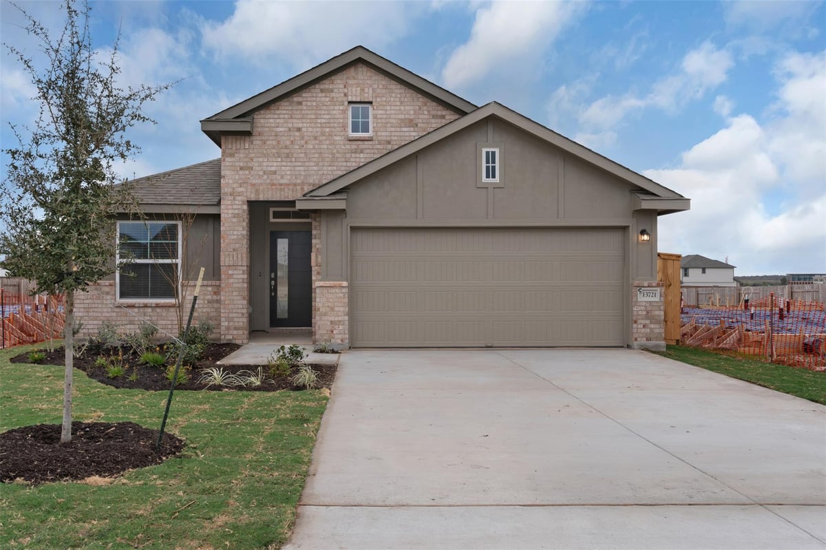 View 13721 Tucker Hedge Pass in Briarwood 13721 Tucker Hedge Pass - front exterior - Luxury home in Briarwood, Elgin, TX