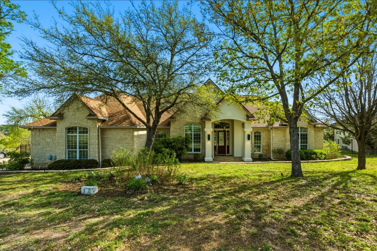 13725 Madrone Mountain Way - front exterior - Luxury home in The Overlook At The Hills Of Texas Estates, Austin, TX
