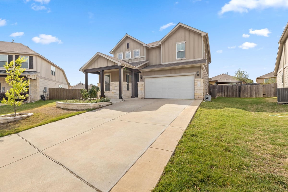 View 138 Fern Dr in Sunfield Ph Two Sec Six 138 Fern Dr - front exterior - Luxury home in Sunfield Ph Two Sec Six, Buda, TX