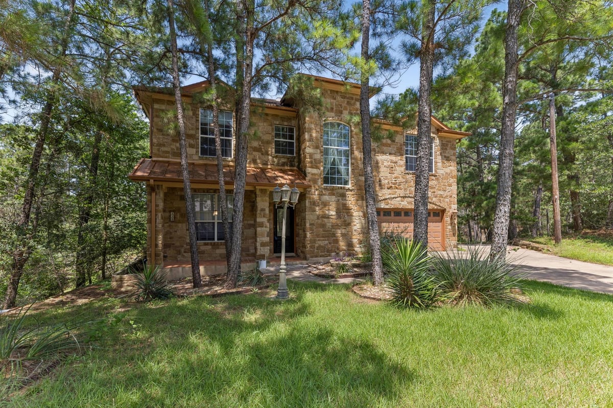 View 138 Papawai DR in Tahitian Village 138 Papawai DR - front exterior - Luxury home in Tahitian Village, Bastrop, TX