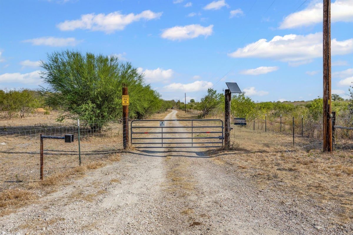 View 13800 Hokanson RD in Harrison 13800 Hokanson RD - property photo 1 - Luxury home in Harrison, Del Valle, TX