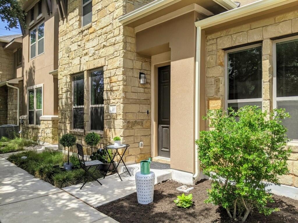 View 13800 Lyndhurst St Unit #21 in Lakeline Center 13800 Lyndhurst St Unit #21 - front exterior - Luxury home in Lakeline Center, Austin, TX