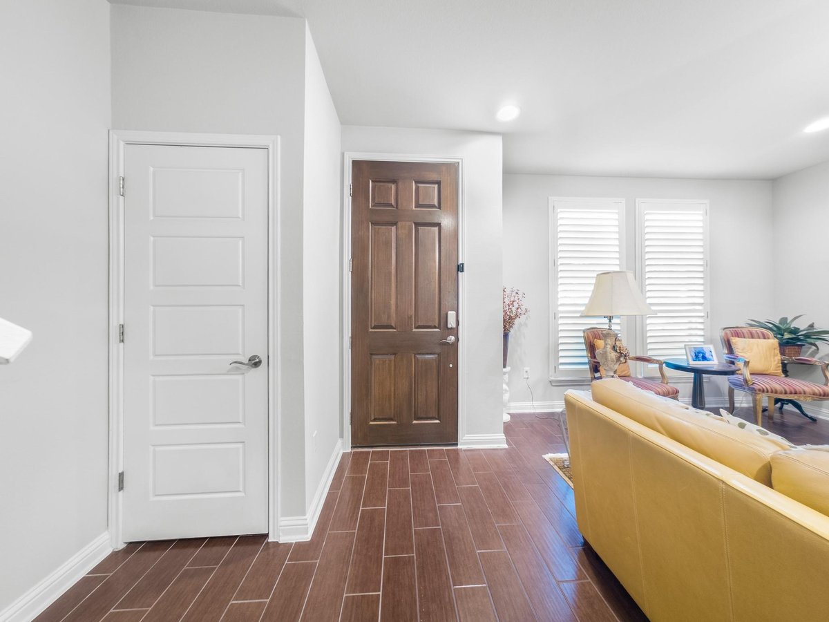 Living area at 13800 Lyndhurst St Unit #324 - 3 bed 2 bath home