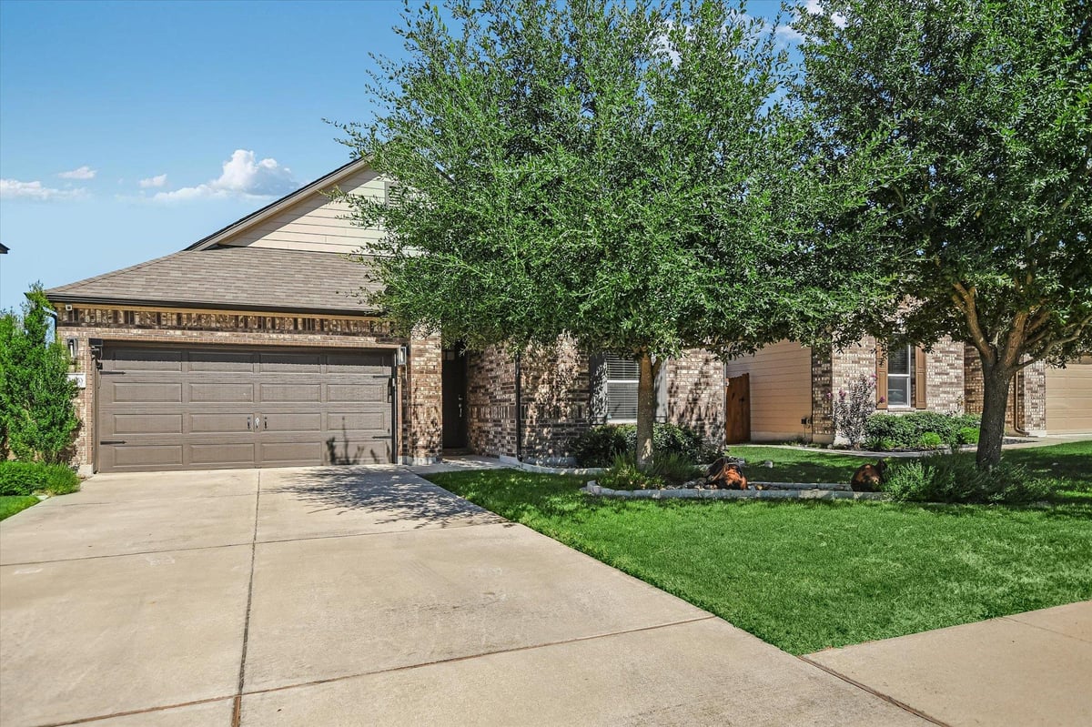 13820 Lyndon B Johnson ST - property photo 1 - Luxury home in Presidential Mdws Sec 9, Manor, TX