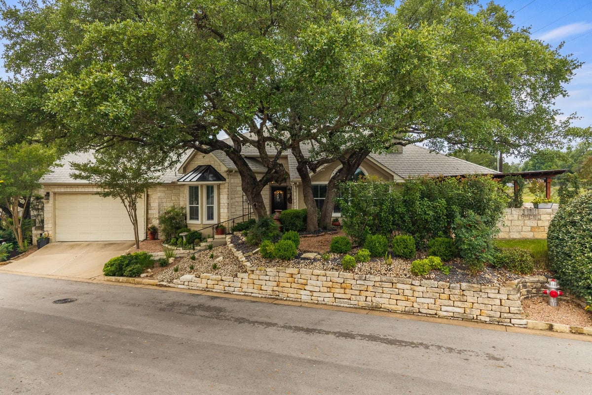 View 139 Double Eagle DR in Villas At Hills Amd 139 Double Eagle DR - front exterior - Luxury home in Villas At Hills Amd, Lakeway, TX