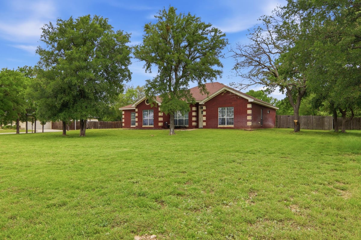 View 1398 County Road 3152 in Lampasas River Place I 1398 County Road 3152 - front exterior - Luxury home in Lampasas River Place I, Kempner, TX