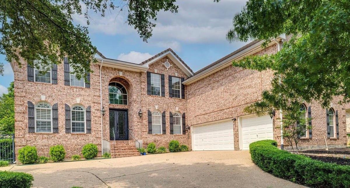 View 14 Torrington Ln in Hills Lakeway Ph 04 14 Torrington Ln - front exterior - Luxury home in Hills Lakeway Ph 04, The Hills, TX