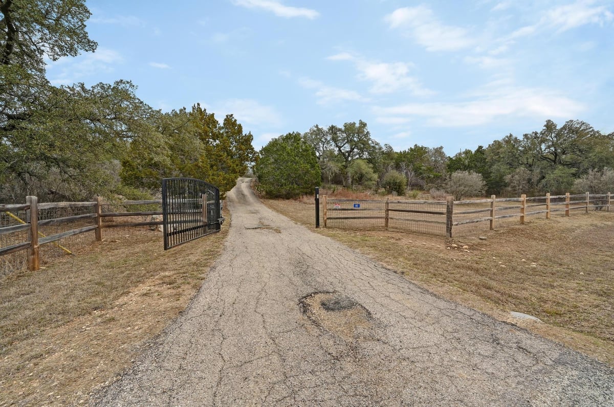 140 Barton Ranch Cir - front exterior - Luxury home in Barton Creek Ranch, Dripping Springs, TX