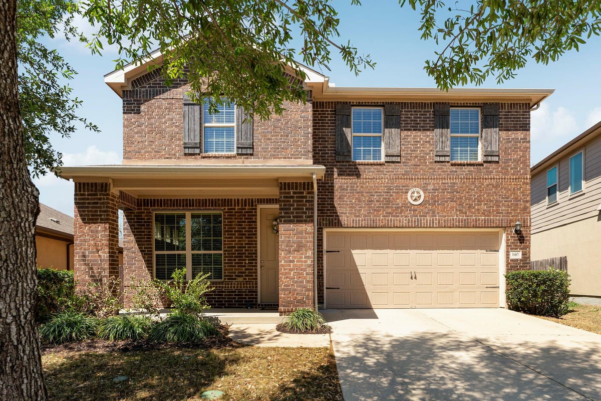 View 140 Brockston Dr in Garlic Creek 140 Brockston Dr - front exterior - Luxury home in Garlic Creek, Buda, TX