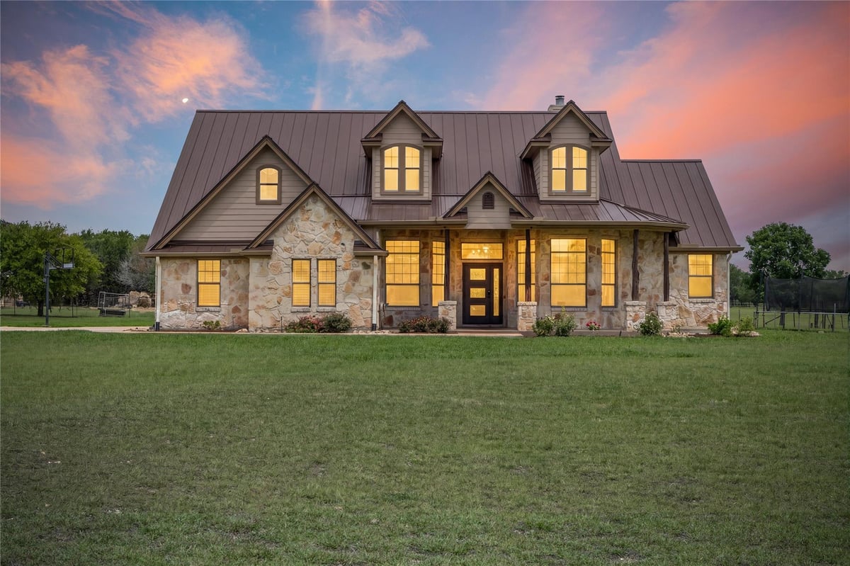View 140 N Encino XING in Post Oak Ranch 140 N Encino XING - front exterior - Luxury home in Post Oak Ranch, Liberty Hill, TX
