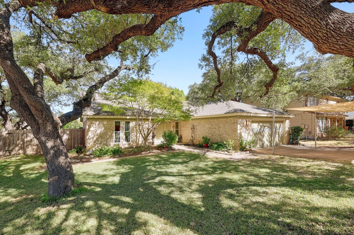 View 1400 Doonesbury DR in Gracywoods Sec 04 1400 Doonesbury DR - front exterior - Luxury home in Gracywoods Sec 04, Austin, TX