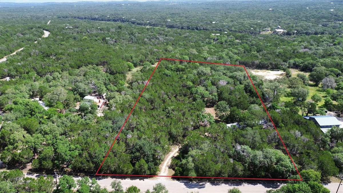View 1400 Valley View RD in Burnett Ranch Sec 3 1400 Valley View RD - front exterior - Luxury lot in Burnett Ranch Sec 3, Wimberley, TX