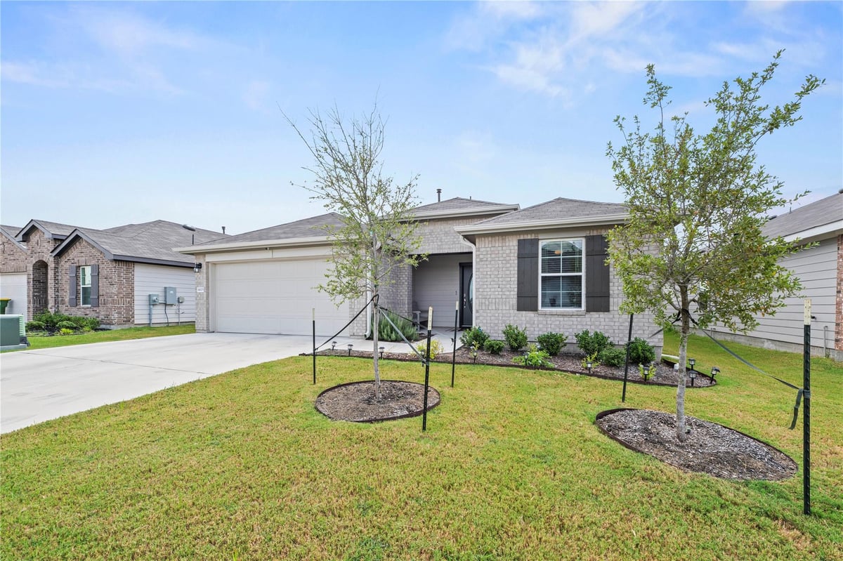14005 Carper DR - property photo 1 - Luxury home in Manor Heights Ph 4 Sec A, Manor, TX