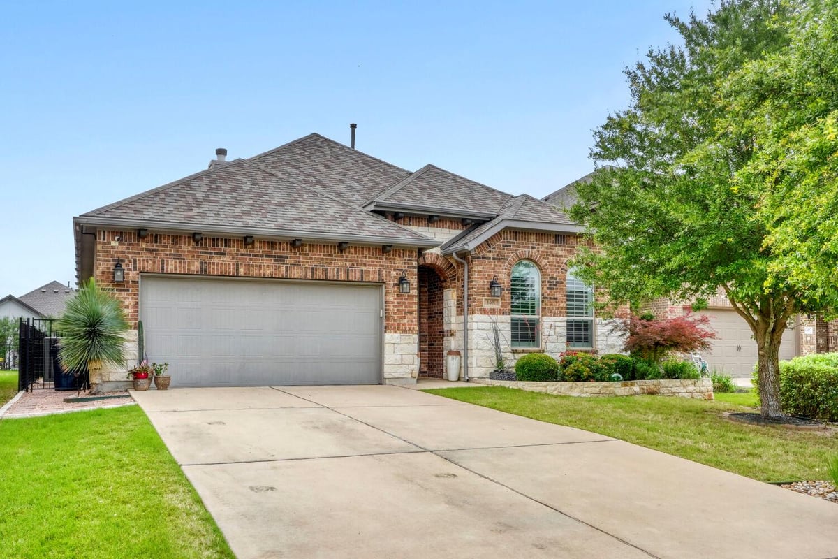View 1401 Calago Cv in Travisso Ph 3 Sec 2 1401 Calago Cv - front exterior - Luxury home in Travisso Ph 3 Sec 2, Leander, TX