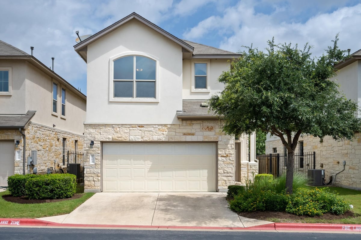 View 1401 Little Elm TRL Unit #203 in WOODFORD CONDO 1401 Little Elm TRL Unit #203 - front exterior - Luxury home in WOODFORD CONDO, Cedar Park, TX