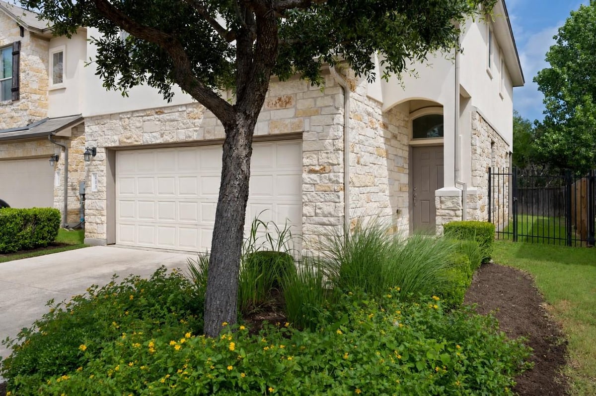 View 1401 Little Elm TRL Unit #203 in WOODFORD CONDO 1401 Little Elm TRL Unit #203 - front exterior - Luxury home in WOODFORD CONDO, Cedar Park, TX