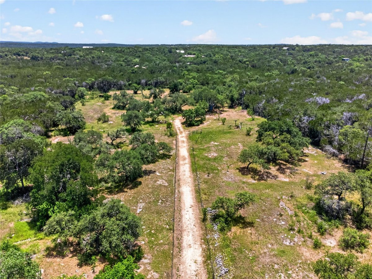 View 1401 Valley View RD in Burnett Ranch Sec 3 1401 Valley View RD - front exterior - Luxury lot in Burnett Ranch Sec 3, Wimberley, TX