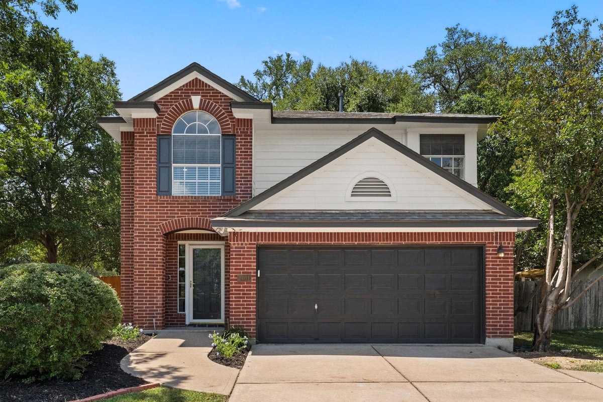 View 1401 Wheatfall Ln in Parkwood 1401 Wheatfall Ln - front exterior - Luxury home in Parkwood, Austin, TX