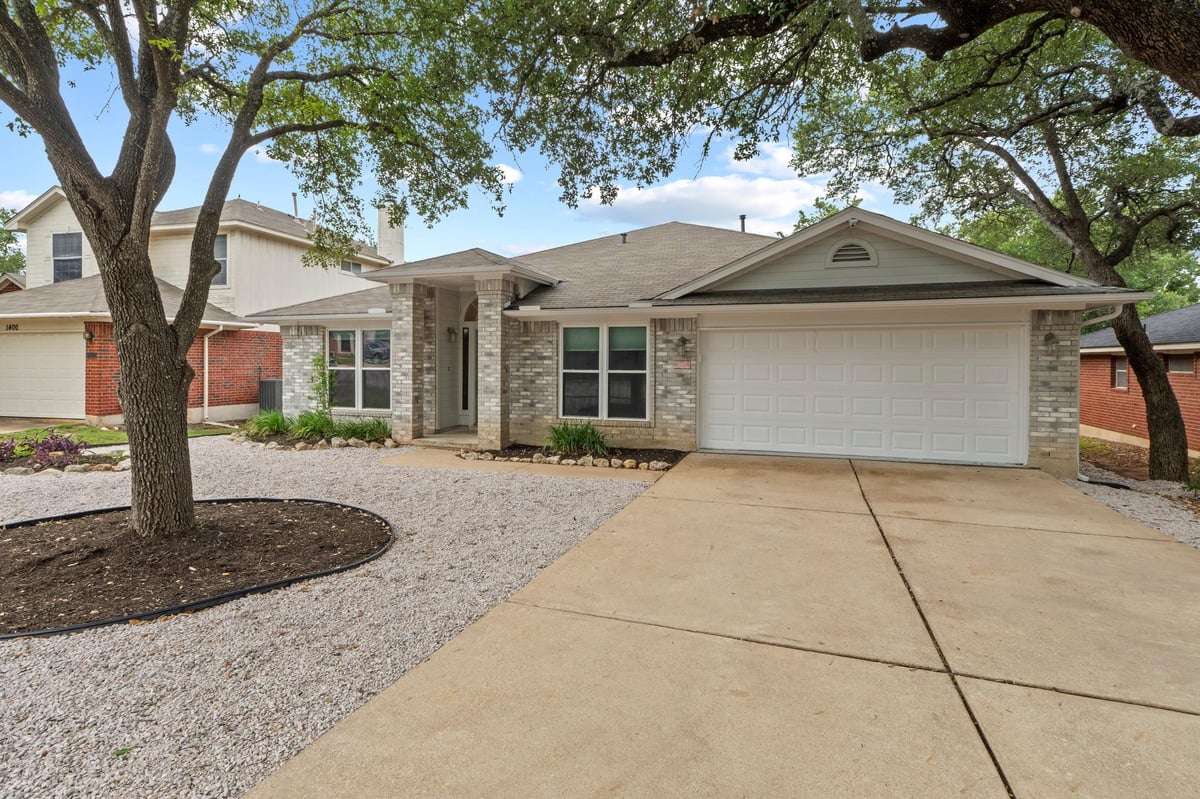 View 1402 Highland DR in Crossing At Carriage Hills 1402 Highland DR - front exterior - Luxury home in Crossing At Carriage Hills, Cedar Park, TX