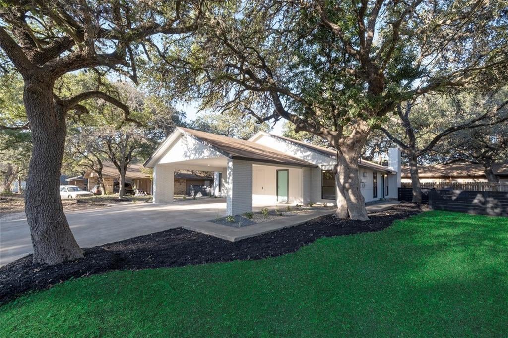 View 1402 Matthews Ln in Wyldwood Sec 01 1402 Matthews Ln - front exterior - Luxury home in Wyldwood Sec 01, Austin, TX