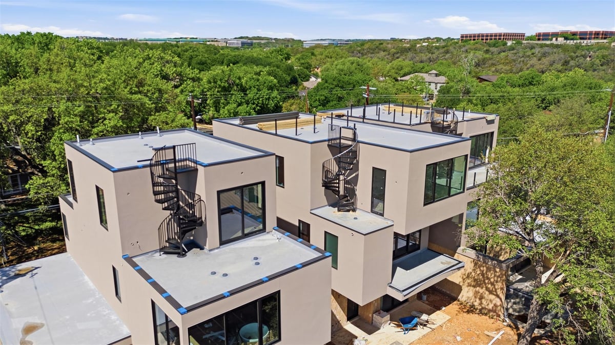 View 1403 Barton Hills Dr Unit #3 in Barton Terrace Sec 04 1403 Barton Hills Dr Unit #3 - aerial view with rooftop terrace - Luxury home in Barton Terrace Sec 04, Austin, TX