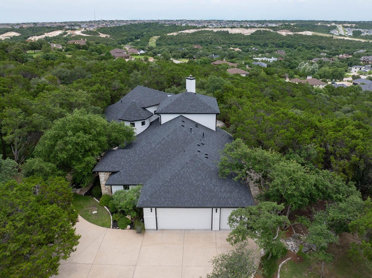 View 1403 Camelback in Grand Mesa At Crystal Falls 1403 Camelback - front exterior - Luxury home in Grand Mesa At Crystal Falls, Leander, TX