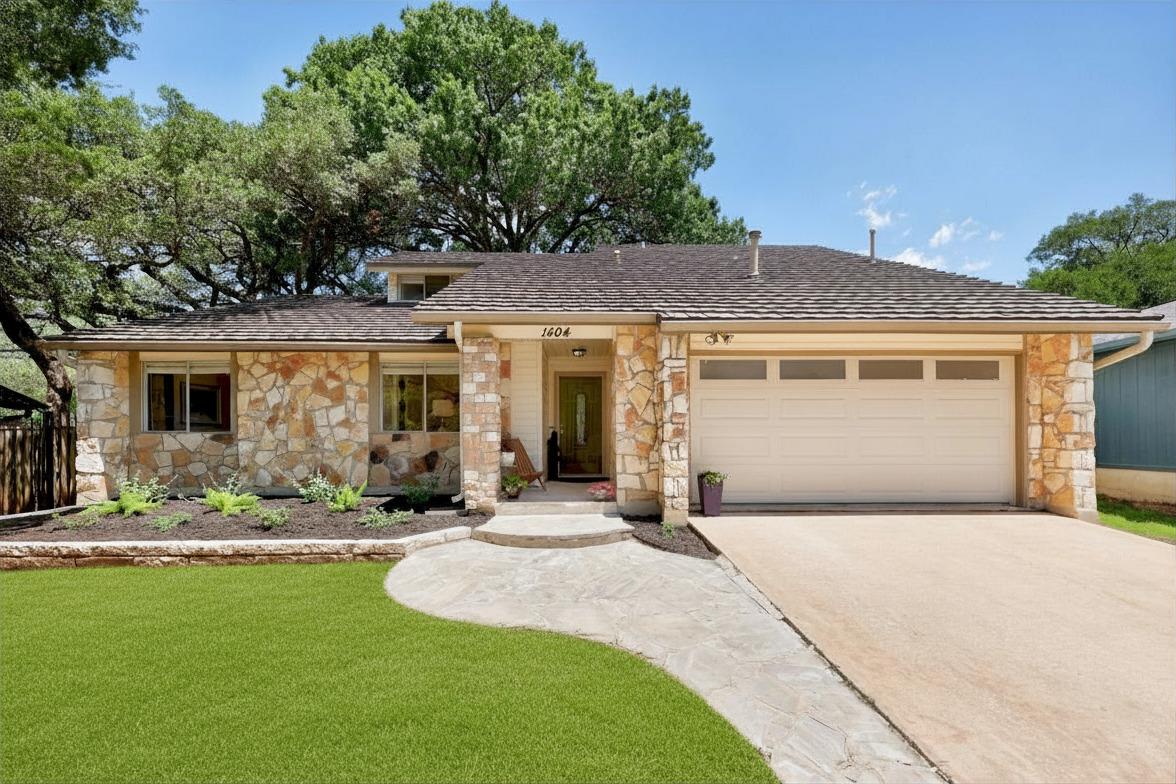 1404 O K Corral - front exterior - Luxury home in Texas Oaks, Austin, TX