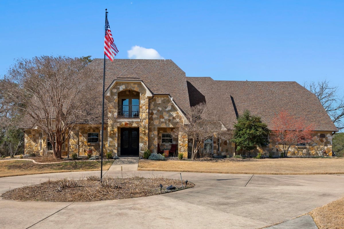 View 14049 Indian Bluff Rd in Seven Coves 14049 Indian Bluff Rd - front exterior - Luxury home in Seven Coves, Temple, TX