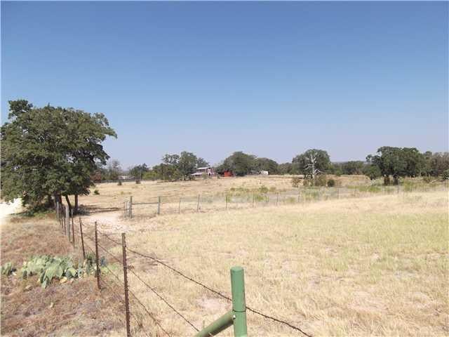 View 1406 Cty Rd 455 1406 Cty Rd 455 - front exterior - Luxury home in Thorndale, TX