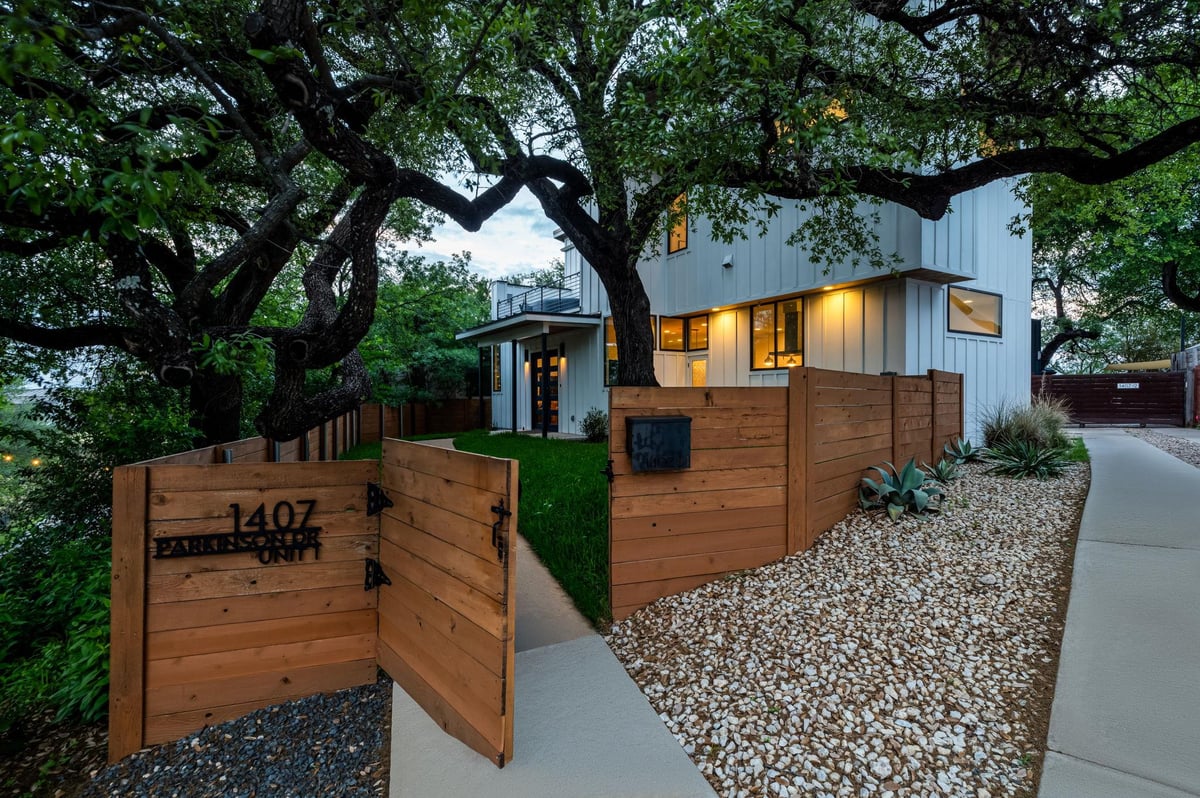 View 1407 Parkinson Dr Unit #1 in Parkinson Place Resub 1 1407 Parkinson Dr Unit #1 - front exterior with modern gated entry - Luxury home in Parkinson Place Resub 1, Austin, TX