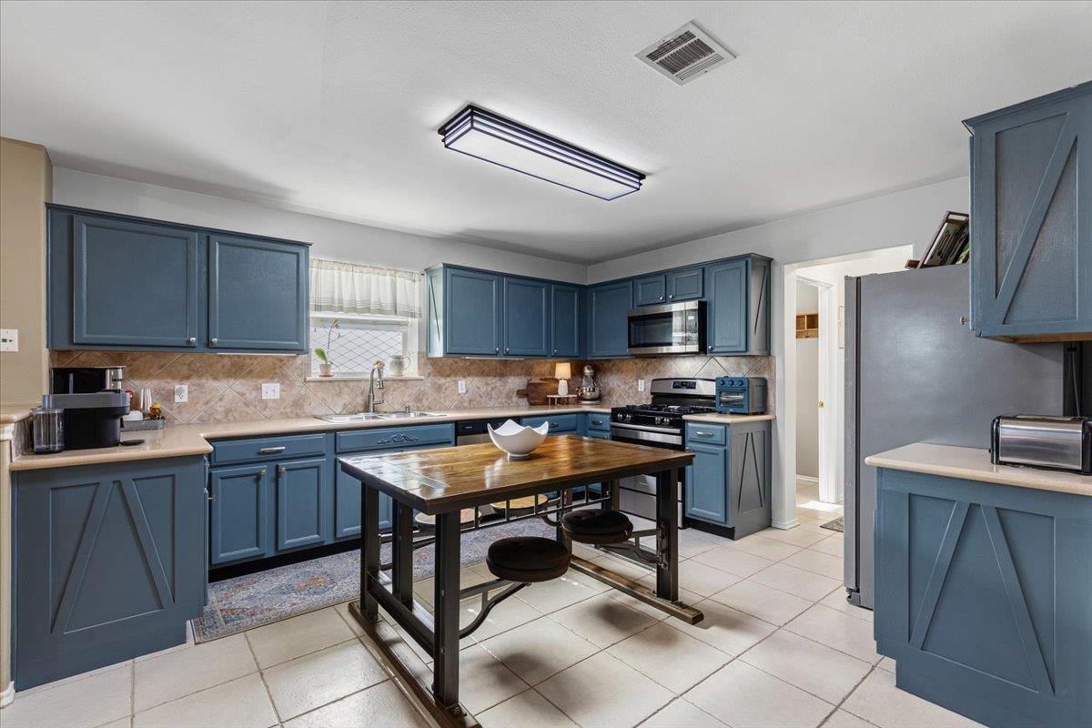 Primary bedroom at 1408 Tumbling River Dr - 4 bed 2 bath home