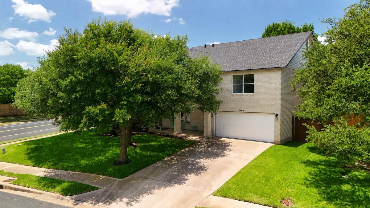 View 1409 Chalk LN in Ranch At Cypress Creek Sec 06 1409 Chalk LN - front exterior - Luxury home in Ranch At Cypress Creek Sec 06, Cedar Park, TX
