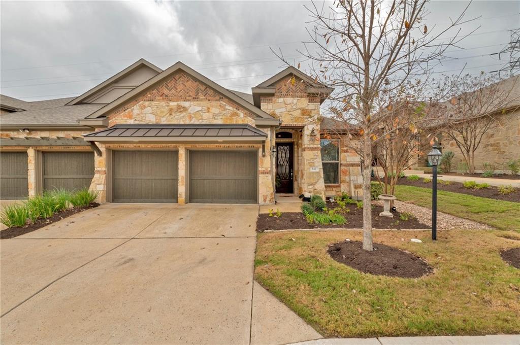 View 141 Cartwheel BND in Rough Hollow 141 Cartwheel BND - front exterior - Luxury home in Rough Hollow, Austin, TX