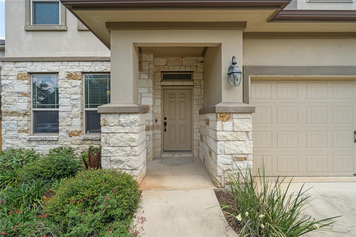 View 141 Sangaree DR in White Oak Preserve 141 Sangaree DR - front exterior - Luxury home in White Oak Preserve, Buda, TX
